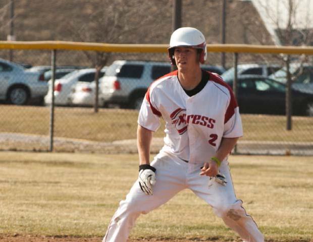 Blake Schmenk takes the lead off first. His 3-for-3 performance, including a two-run homer in the third inning, in the first game helped the Express shutout Lorain County 10-0. Photo by Seth Foley