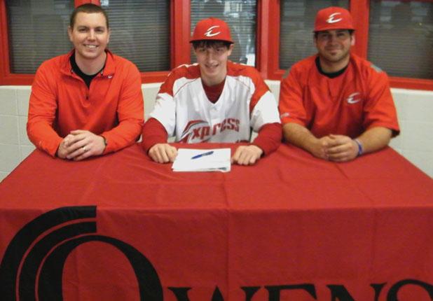 Bishop Foley's Brian Bayliss Jr. became the third signee of the 2012-13 Express baseball class on Sunday. He is flanked to his right by Express head coach Del Young and assistant coach Scott Tesluck to his left. Photo courtesy of Owens Sports Information