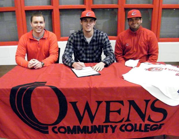 Ben Breymier becomes the first Express baseball recruit of the 2012-13 class to sign. He is pictured here with Express head coach Del Young to his right and assistant coach Scott Tesluck to his left.