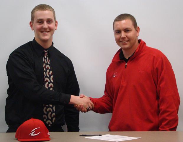 Nick Street, left, shakes hands with Express baseball head coach Del Young after becoming the newest member of the 2012-13 Express baseball freshmen class. Photo courtesy of Owens Sports Information