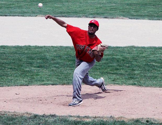Jordan Hill delivers a pitch in today's first game against Delta College. He threw four scoreless frames to help keep the game close. Photo by Rudy Yovich/Owens Sports Information
