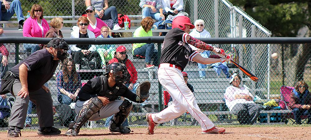 Charlie Sipe connects with a pitch in this photo. The sophomore had a monster day at the plate today, highlighted by a three-run home run. Photo by Kylie Reynolds/Owens Sports Information