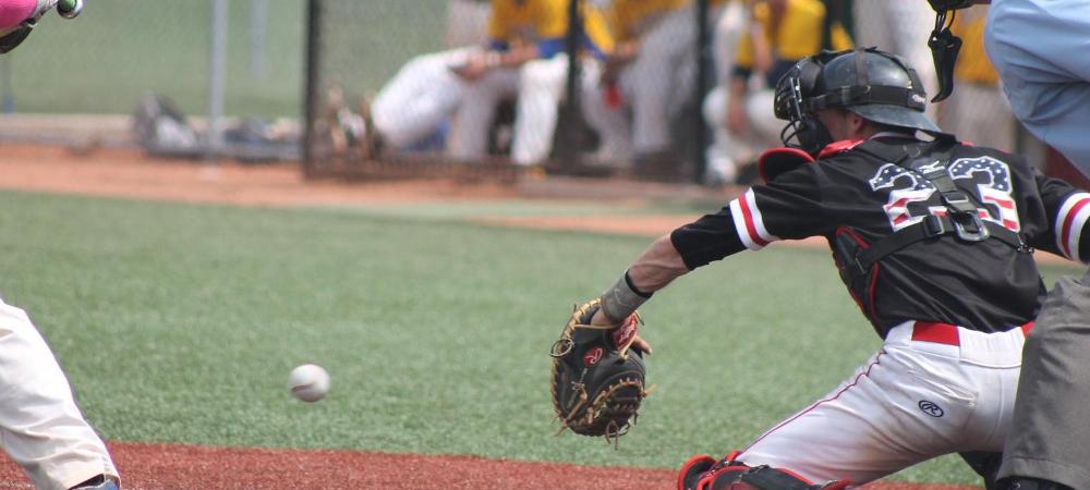 Zach Coffield receives a pitch during a game against Vincennes. Photo by Nicholas Huenefeld/Owens Sports Information