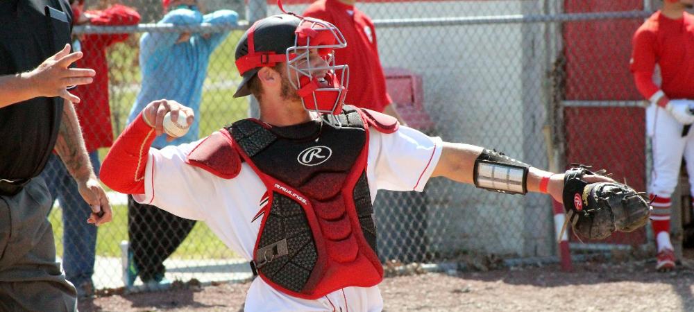 Zach Souter is shown here throwing a ball back to the pitcher. Photo by Nicholas Huenefeld/Owens Sports Information