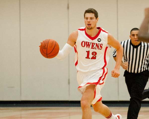 Jay Marquette brings the ball up the court for the Express. Photo by Seth Foley