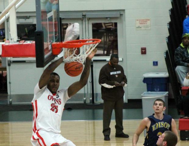 James Kelly throws down one of this six dunks in the win over Edison.He broke the career rebounding record tonight. Photo by Dave Harrand/Owens Sports Information