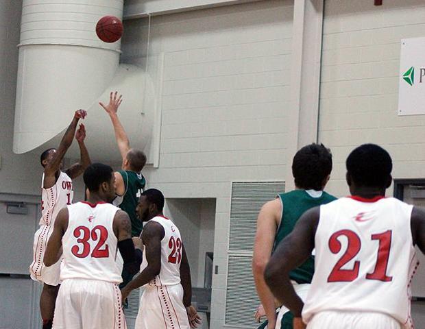 Edmond Early Jr. (9 pts, 4 assists) attempts a corner 3-pointer in the second half of tonight's 97-74 Express win. Photo by Nicholas Huenefeld/Owens Sports Information