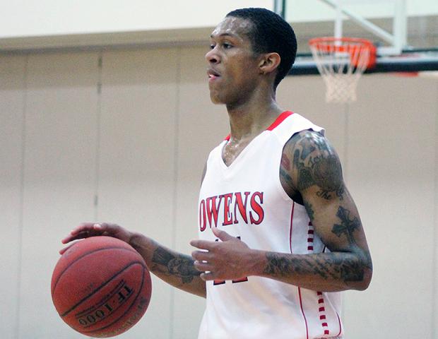 Edmond Early Jr. (pictured here) had 10 points off the bench in today's 100-87 win over Edison Community College. The freshman guard even threw down a one-handed dunk on a fast break in the first half. Photo by Nicholas Huenefeld/Owens Sports Information