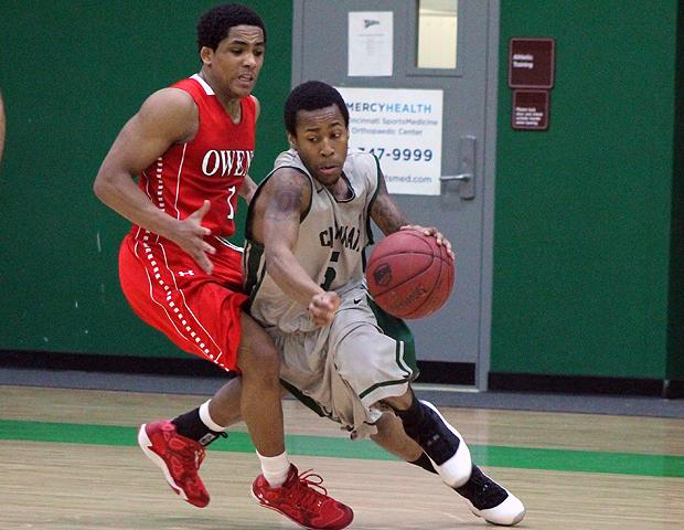 The Surge's Orlando Berry (7 assists, 0 turnovers) drives around Shaakir Lindsey in today's 80-67 loss to No. 2 Cincinnati State. Photo by Nicholas Huenefeld/Owens Sports Information