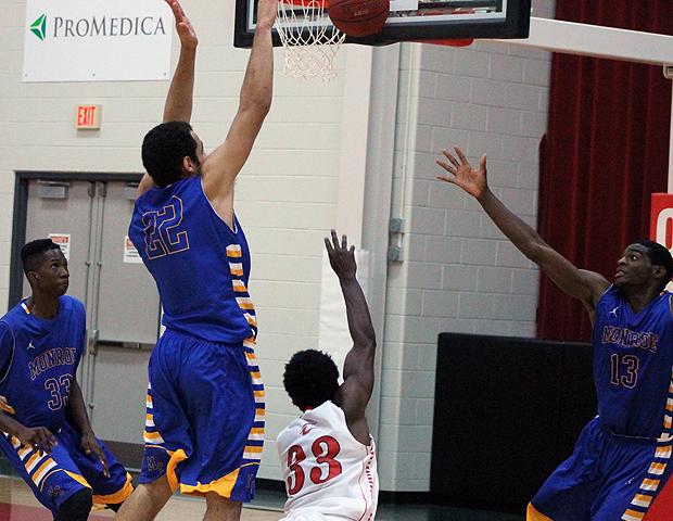Tony Boykins (33) misses a shot while falling down as time expired in regulation against Monroe College. The Express lost 92-85 in OT. Photo by Nicholas Huenefeld/Owens Sports Information