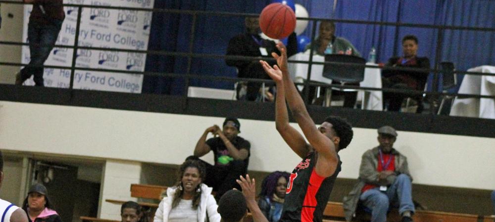 Xavier Cochran, pictured here attempting a 3-pointer, scored 52 points over two games this weekend. Photo by Nicholas Huenefeld/Owens Sports Information