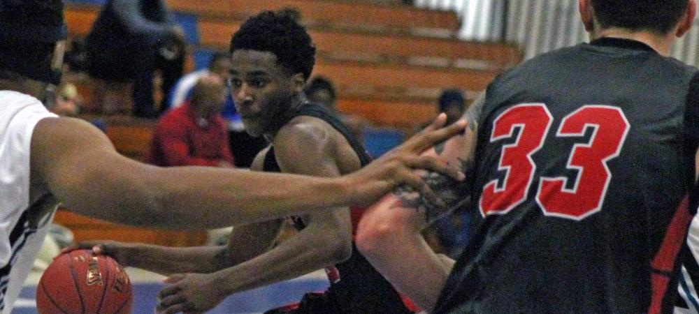 Xavier Cochran, pictured here driving the ball to the hoop, had a team-high 24 points today. Photo by Nicholas Huenefeld/Owens Sports Information