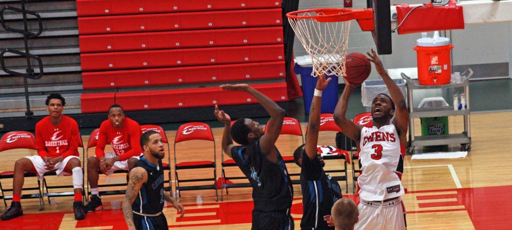 Charles Penn III looks to score down low. He had a team-high 13 points vs Cuyahoga. Photo by Kyle Brown/Owens Sports Information