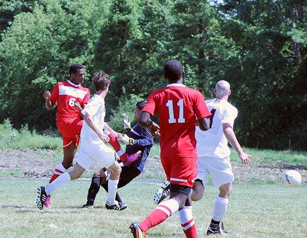 Jahmall Whittaker (6) beats the goalkeeper for the game winning goal in a 4-2 Express win. Photo by Nicholas Huenefeld/Owens Sports Information