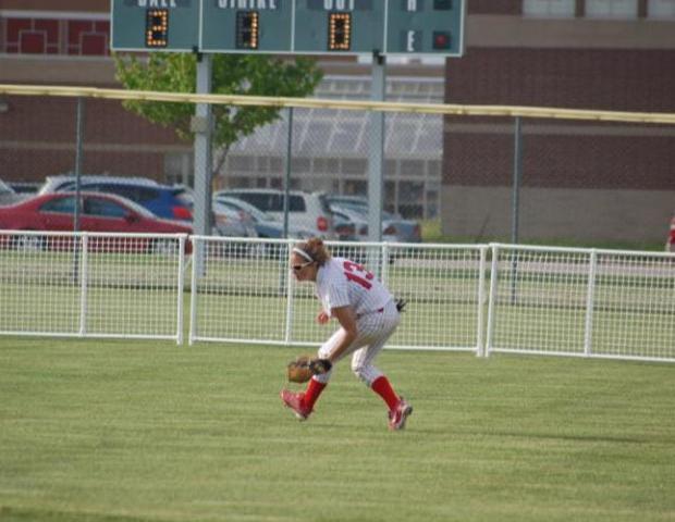 Kristen Roznoski fields a ball in centerfield. The sophomore broke the school record for runs scored in the game against East Central. Photo courtesy of Sharon Snyder