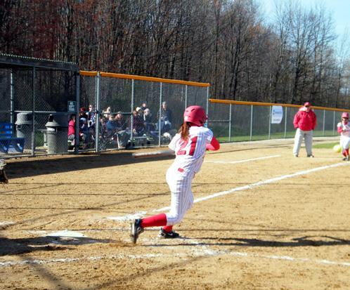 Melanie Iacoangeli prepares to connect with a pitch. The freshman took over the team lead in batting average among regulars with her 3-for-7, two run, two RBI, five stolen base day. Below right, Olivia Reeder reminds her team that there is two outs, while below left, Mareshah Scott leads off second. She is now 10-for-10 in stolen bases this year. Photos courtesy of Alyssa Lassey/Owens Sports Information