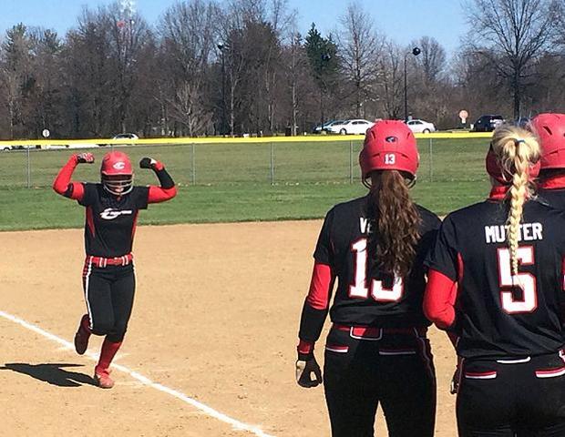 Emily Rockman flexes while rounding the bases on one of her three homers in today's doubleheader. Photo by Nicholas Huenefeld/Owens Sports Information