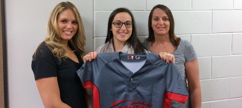 Michayla Barga, center, is pictured with her mother, Sandra, to her left and her sister, Tara, to her right. Photo by Owens Sports Information
