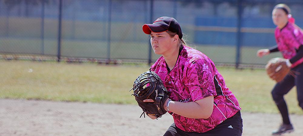 Tori Weidinger prepares to field the first base position in today's doubleheader against Macomb Community College. Photo by Nicholas Huenefeld/Owens Sports Information