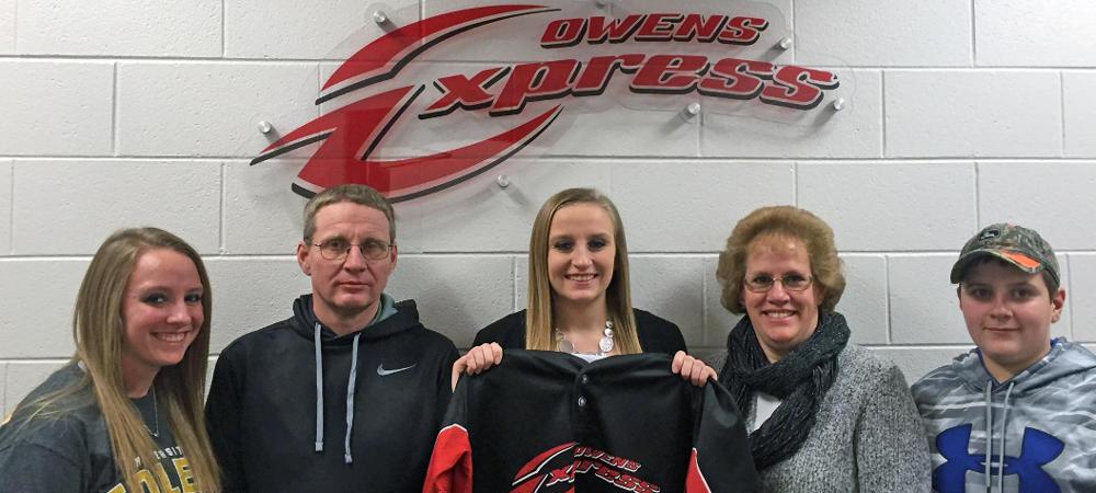 Lindsay George, center, is pictured with her family on signing day. Photo by Owens Sports Information