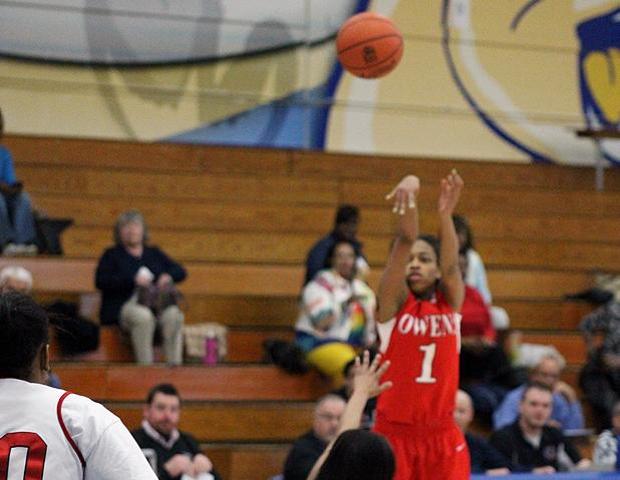 Uniqua Mitchell shoots a jumper in the final game of last season. The sophomore has signed with Claflin University, an NCAA D-II school. Photo by Nicholas Huenefeld/Owens Sports Information