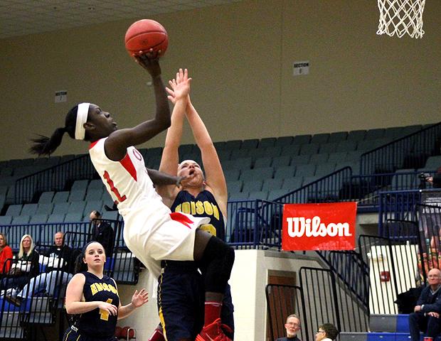 Eboni Adams, pictured here going up for a floater against Edison in the district semifinals, has signed with UNOH. Photo by Geoff Roberts/Owens Sports Information