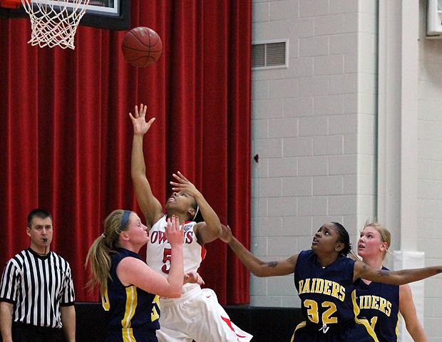 Carter drives to the hoop for a lay-up during the second half of today's 98-44 win over GRCC. The sophomore had a season-high 31 points as the Express picked up their 13th straight win. Photo by Nicholas Huenefeld/Owens Sports Information