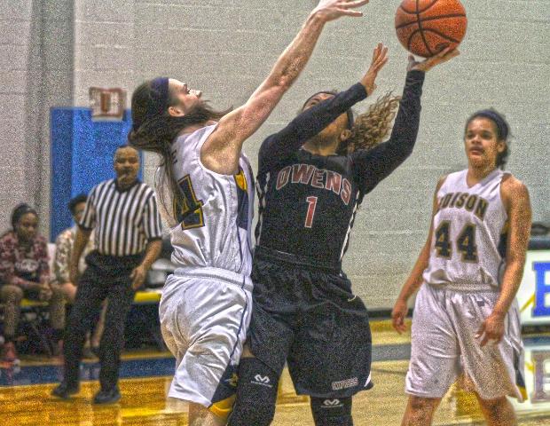 Briana Williams looks to score under the basket in today's 101-71 win over Edison. The freshman guard had a season-high 22 points. Photo by Tobias Flemming/Owens Sports Information