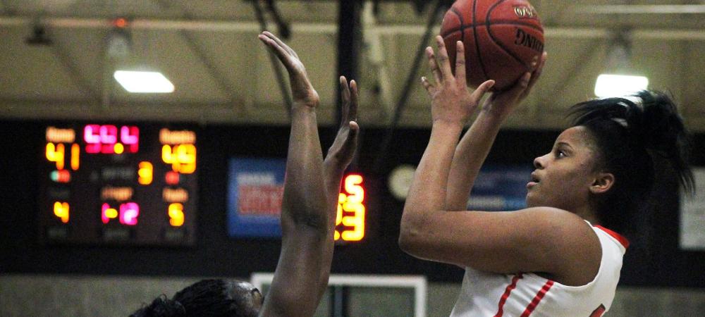 Aysah Ingram goes up for a jumper late in today's third quarter. Photo by Nicholas Huenefeld/Owens Sports Information