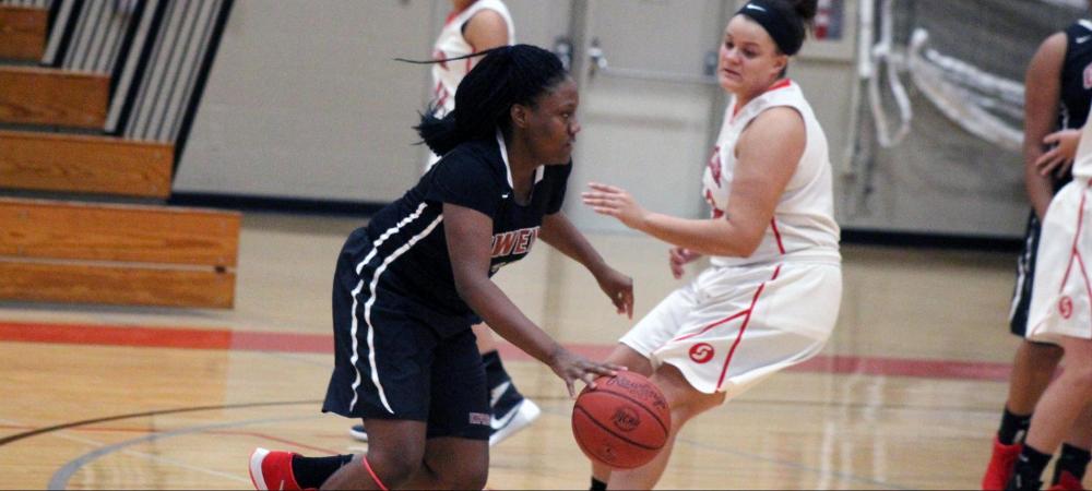 Kyra Johnson looks to drive into the paint during the first half of today's 65-45 win. Photo by Nicholas Huenefeld/Owens Sports Information