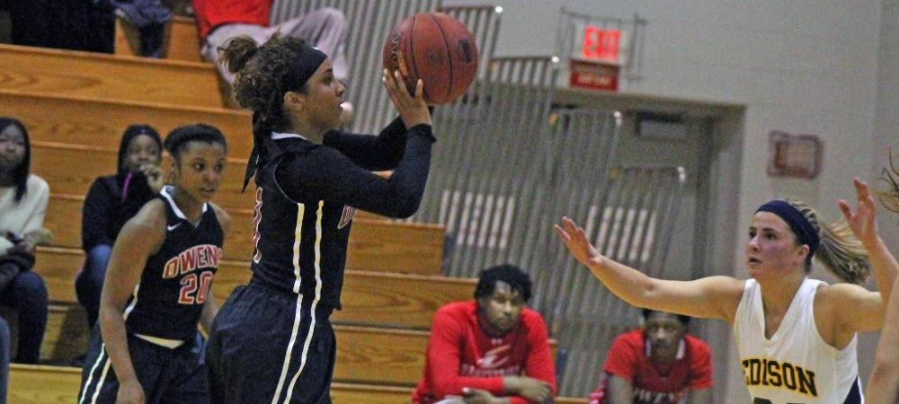 Briana Williams skies for a jumper during the second half of today's 103-84 win over Edison. Photo by Nicholas Huenefeld/Owens Sports Information