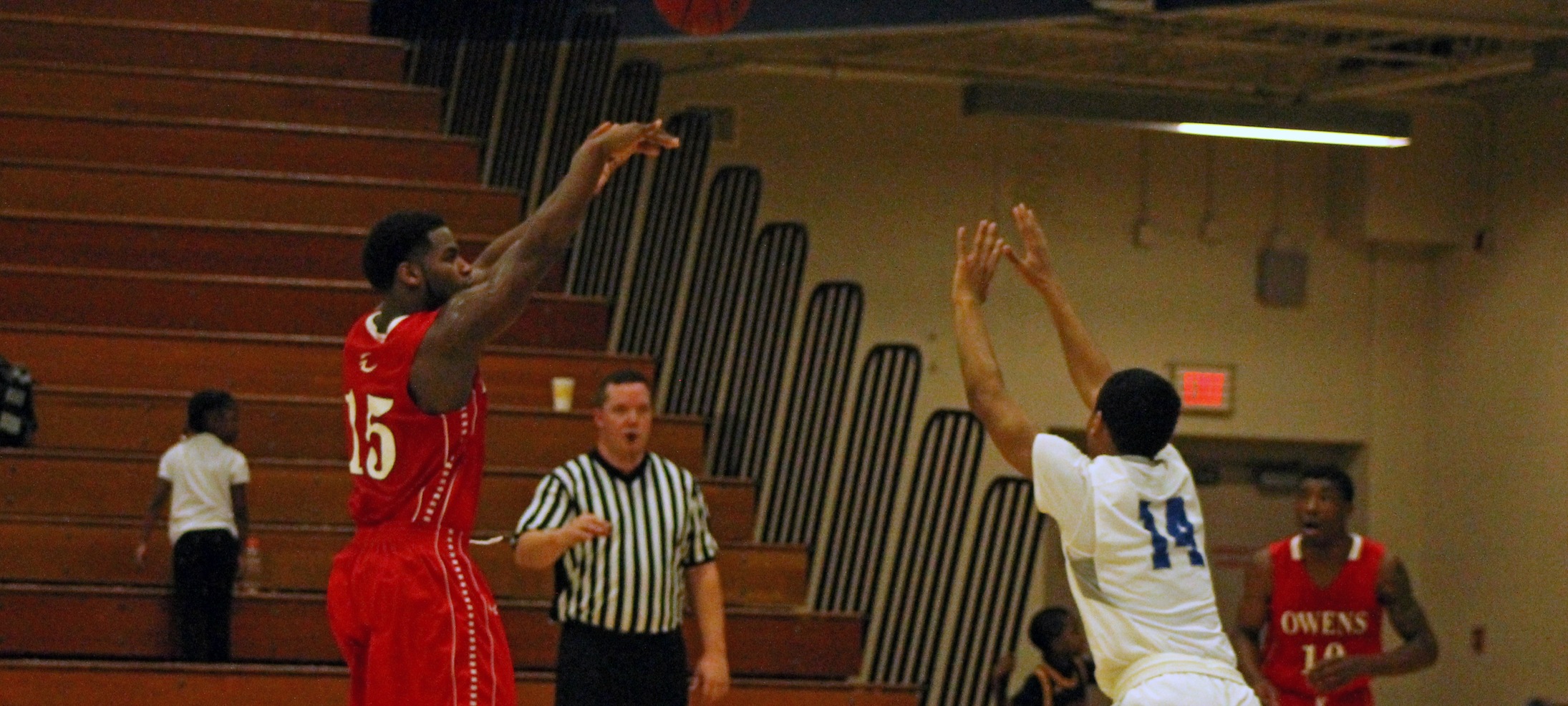 Marquevious Wilson attempts a 3-pointer against Lakeland tonight. The freshman had 18 points. Photo by Nicholas Huenefeld/Owens Sports Information