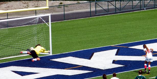 Haley Gasser scores on a PK. Photo by Nicholas Huenefeld