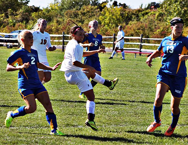 Kendyl Christian watches her goal sail into the net today as Haley Malaczewski (19) looks on. Photo by Nicholas Huenefeld/Owens Sports Information