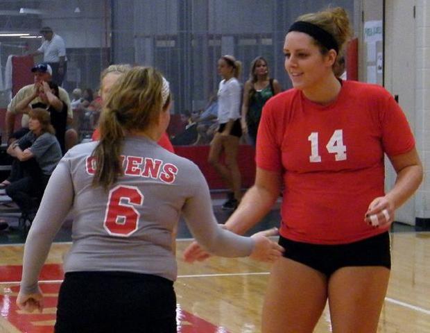 Ellie Comes, left, and Brittany Egbert perform their pregame handshake prior to a match against Hagerstown. Both were named to the NJCAA Div. II All-American team. Photo by Nicholas Huenefeld