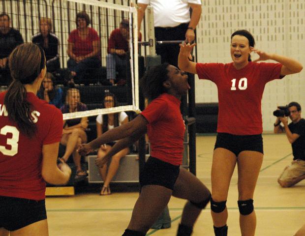 Dakia Sellers, center, celebrates a point late in the fifth set of the upset of No. 2 Oakland Community College on Monday. Kenzie Kleinhenz (10) and Alyssa Meis (3) are also pictured. Photo courtesy of Nicholas Huenefeld/Owens Sports Information