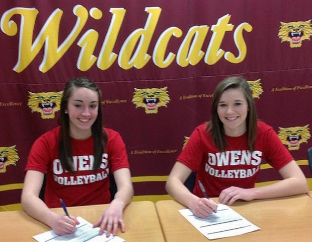 Bailey Dangler and Kayla Siefker (L to R) sign their letters of intent to play for the national powerhouse Express women's volleyball program next year. Photo by Sonny Lewis/Owens Sports Information